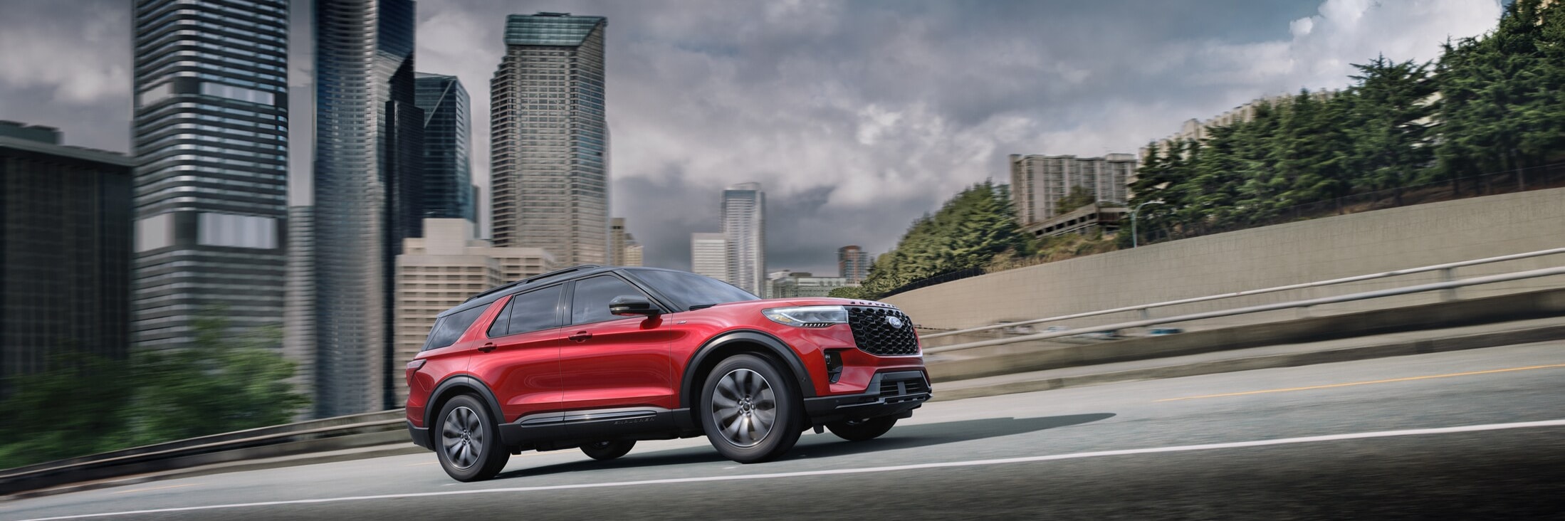 Ford Explorer Red Explorer driving on a city road