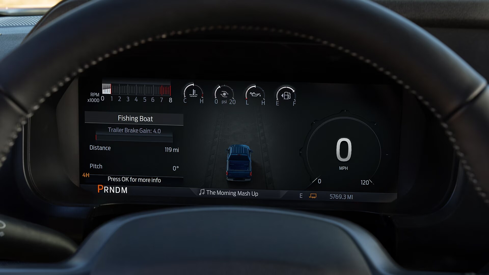 2024 Ford F150® PowerBoost® Hybrid pickup being driven on an open road