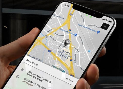  Looking at phone for the best route