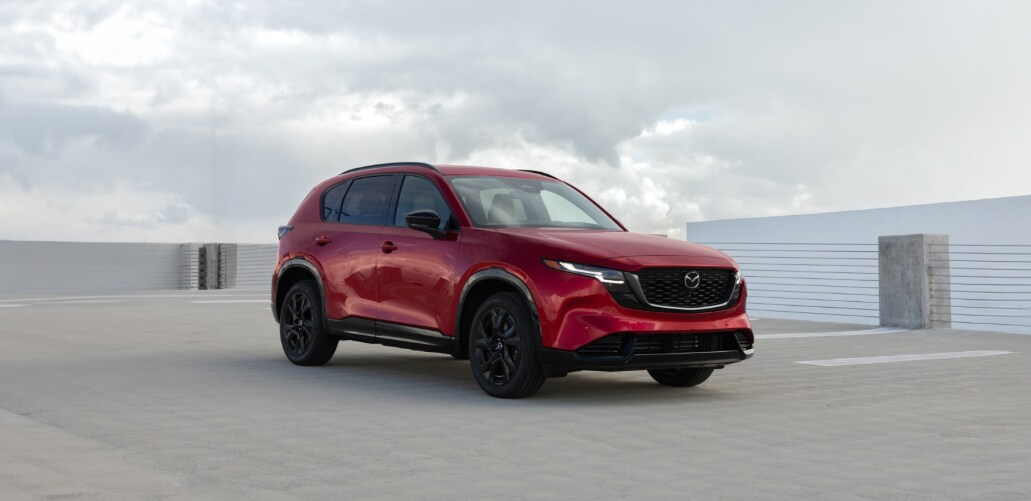  Red 2026 Mazda CX-5 in parking garage roof top.