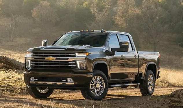  Person cheerfully signing documents.