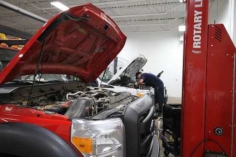 person working on an engine in York, PA