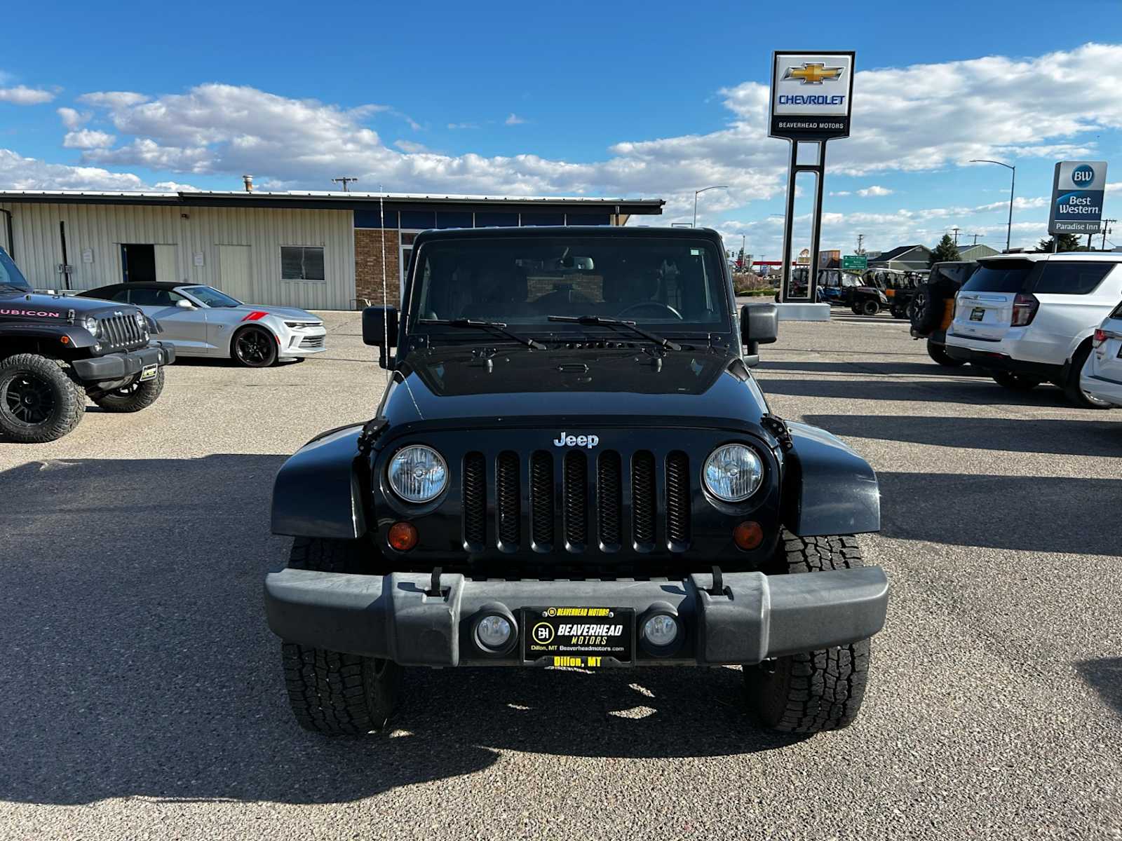 Used 2013 Jeep Wrangler Unlimited Sahara with VIN 1C4BJWEG4DL590285 for sale in Dillon, MT