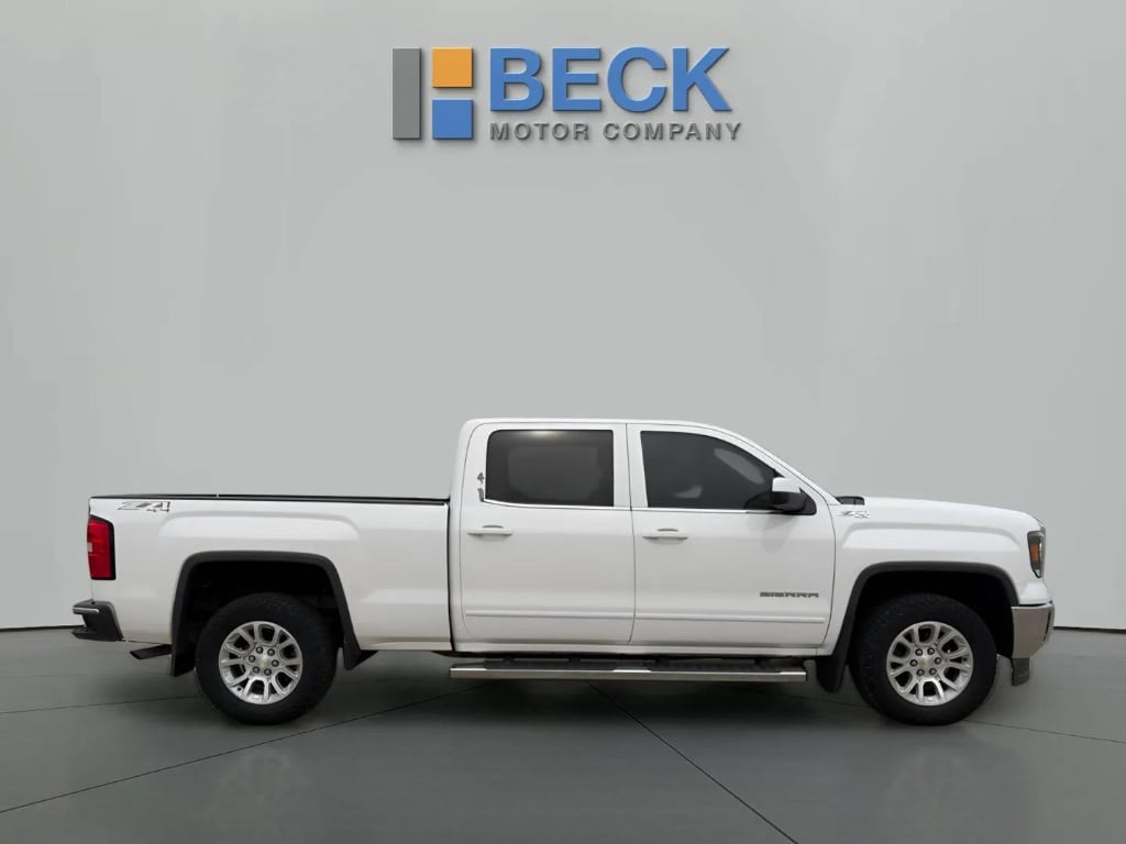 Used 2015 GMC Sierra 1500 SLE with VIN 3GTU2UEC9FG242814 for sale in Pierre, SD