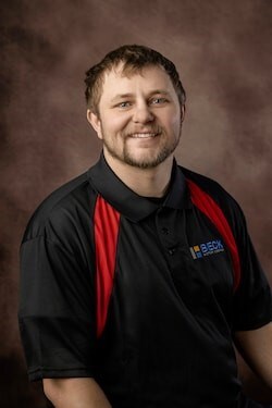 Staff member TRAVIS HILL from ID_2049e0