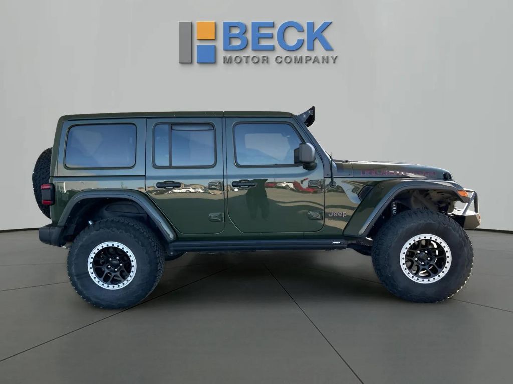 Used 2021 Jeep Wrangler Unlimited Rubicon with VIN 1C4JJXFMXMW696857 for sale in Pierre, SD