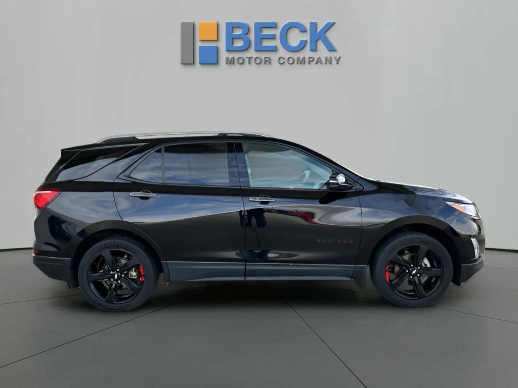 Used 2021 Chevrolet Equinox Premier with VIN 2GNAXXEV8M6103295 for sale in Pierre, SD