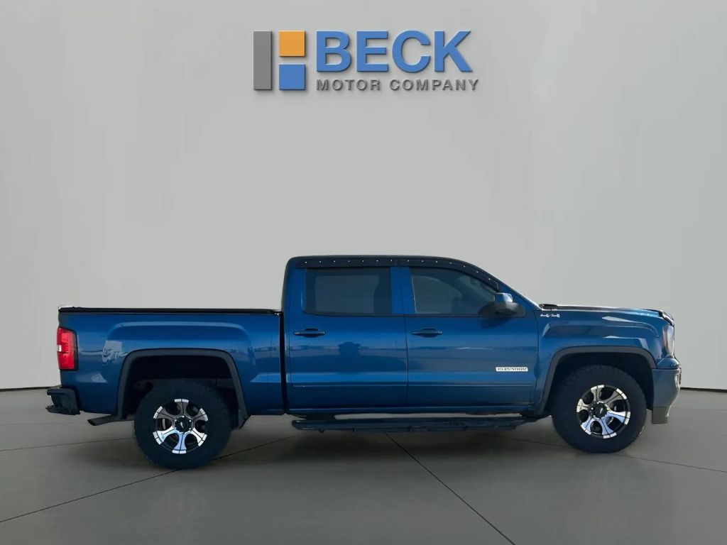 Used 2018 GMC Sierra 1500 SLE with VIN 3GTU2MEC7JG111101 for sale in Pierre, SD