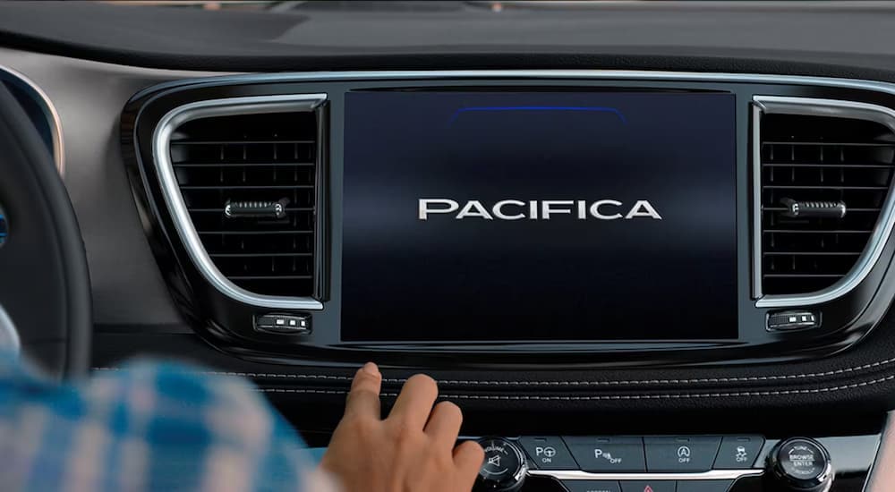 A close up of the infotainment screen in a 2024 Chrysler Pacifica Hybrid.