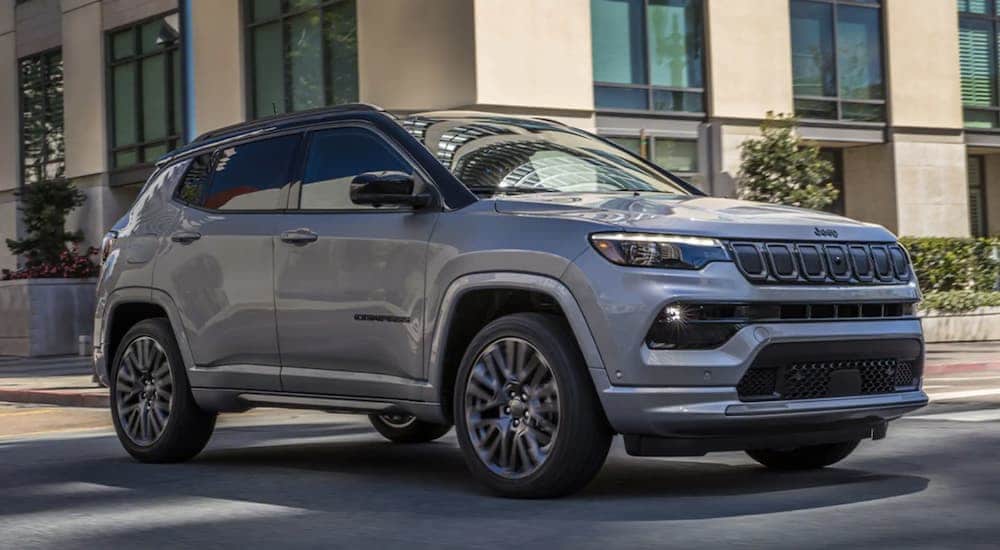 A grey 2022 Jeep Compass driving to a Jeep dealer near North Adams.
