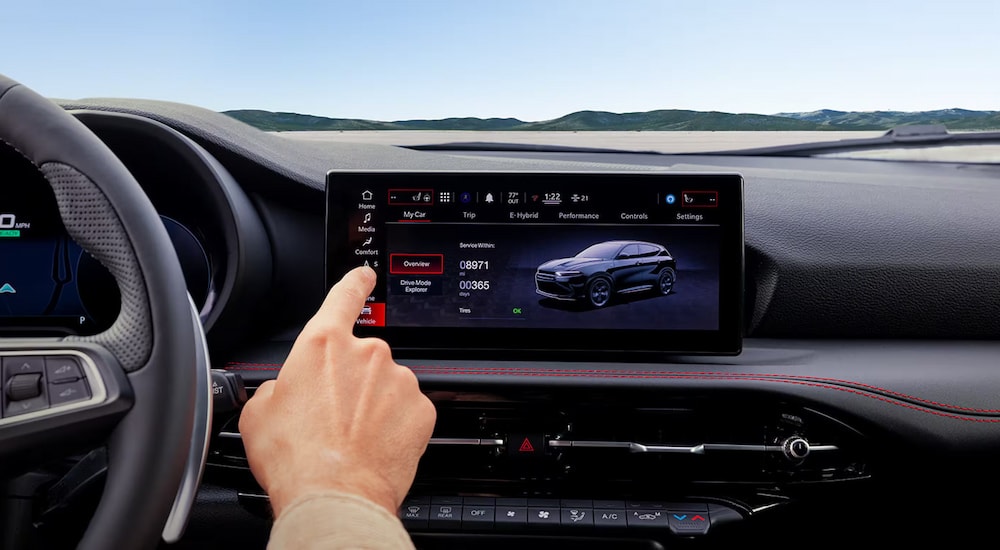 Close-up of the infotainment screen in a 2024 Dodge Hornet at a Dodge dealer near Pittsfield.