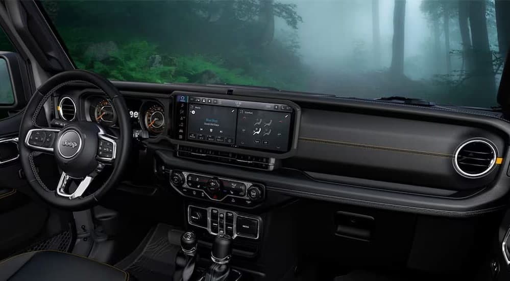 Black interior in a 2025 Jeep Wrangler for sale.