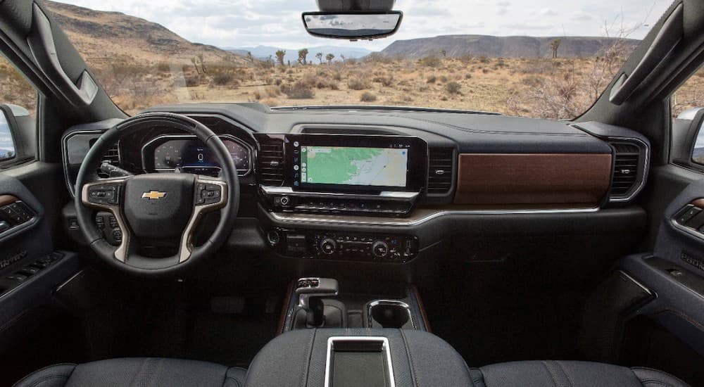 The interior of a 2024 Chevy Silverado 1500 High Country is shown from above the center console.