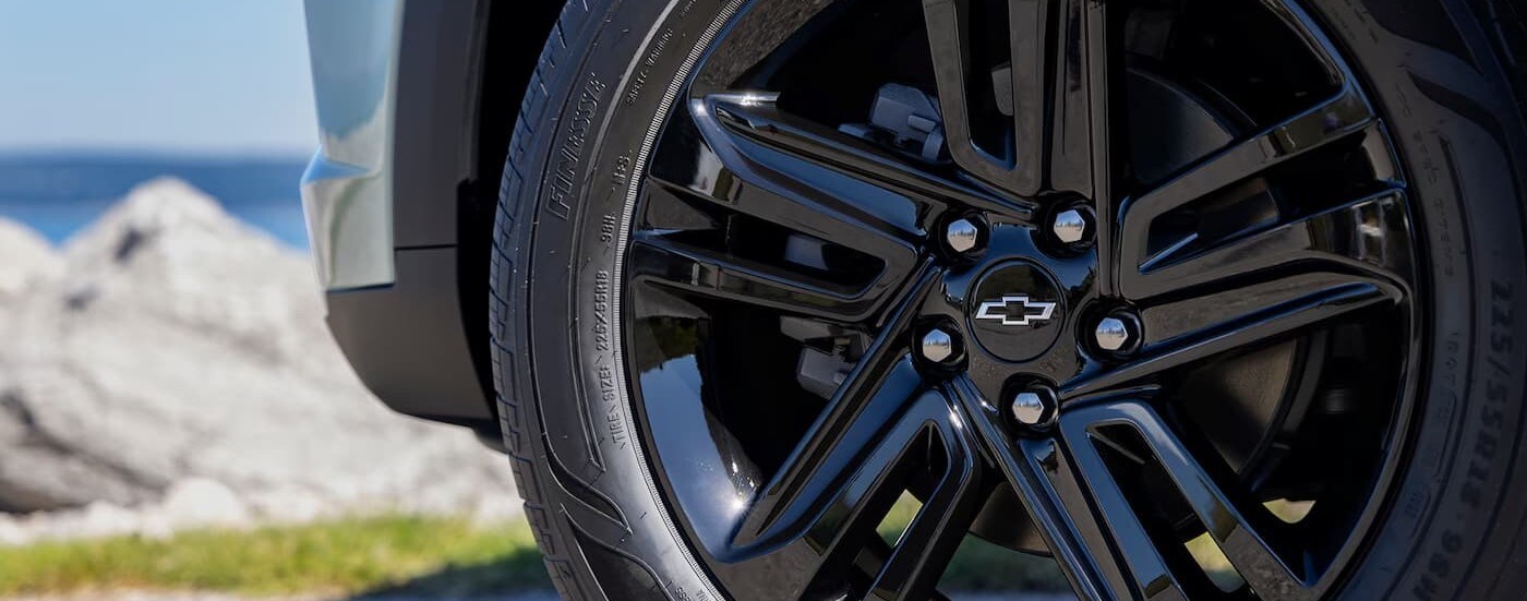 A close-up of a wheel is shown on a 2025 Chevy Trax for sale near Bennigton.