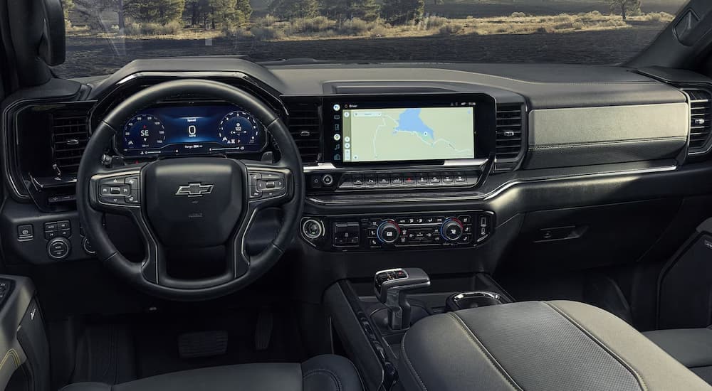 The cabin of a 2024 Chevy Silverado 1500 at a Chevy dealer near Greenfield.