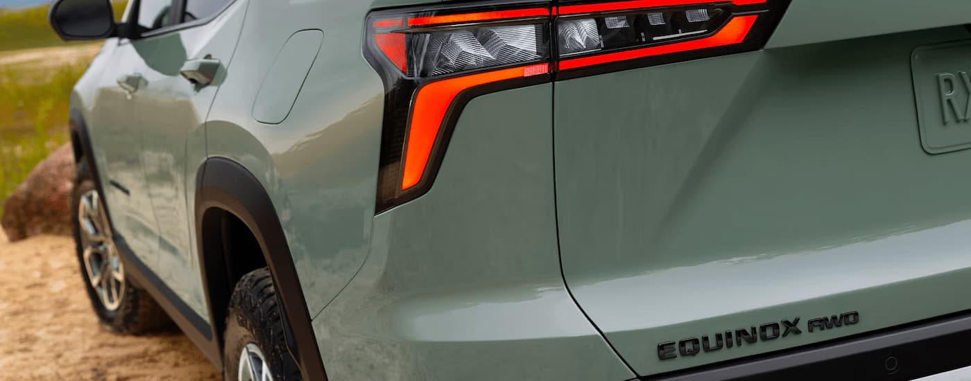 The rear bumper on a green 2025 Chevy Equinox ACTIV for sale near North Adams.