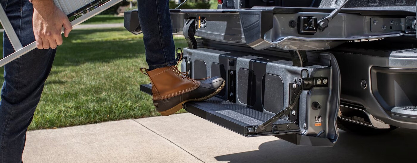 Close-up of the open Multi-Flex Tailgate on a 2024 Chevy Silverado 1500 for sale near Greenfield.