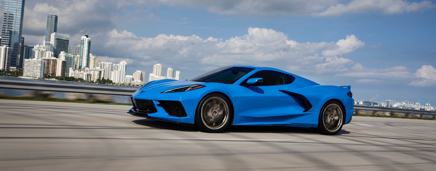 A blue 2024 Chevy Corvette Stingray is shown from the side after leaving a Chevy dealer near Northampton.