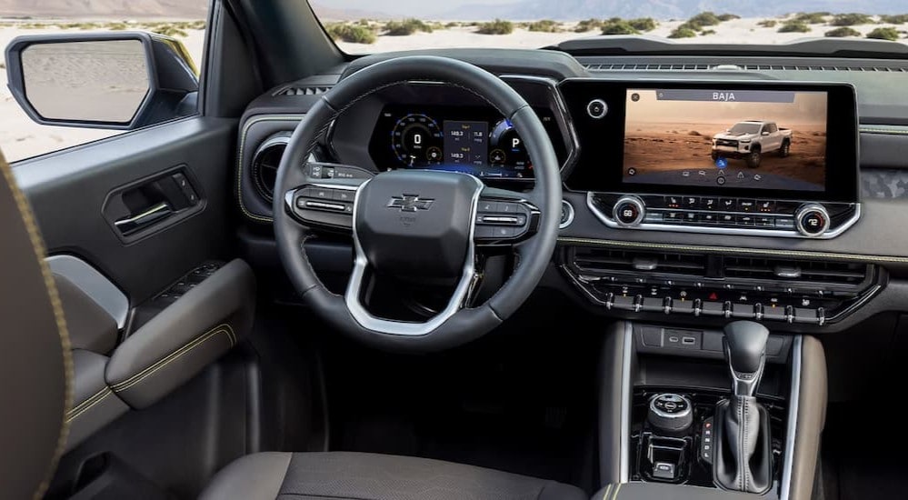 The gray dash is shown in a 2024 Chevy Colorado for sale.