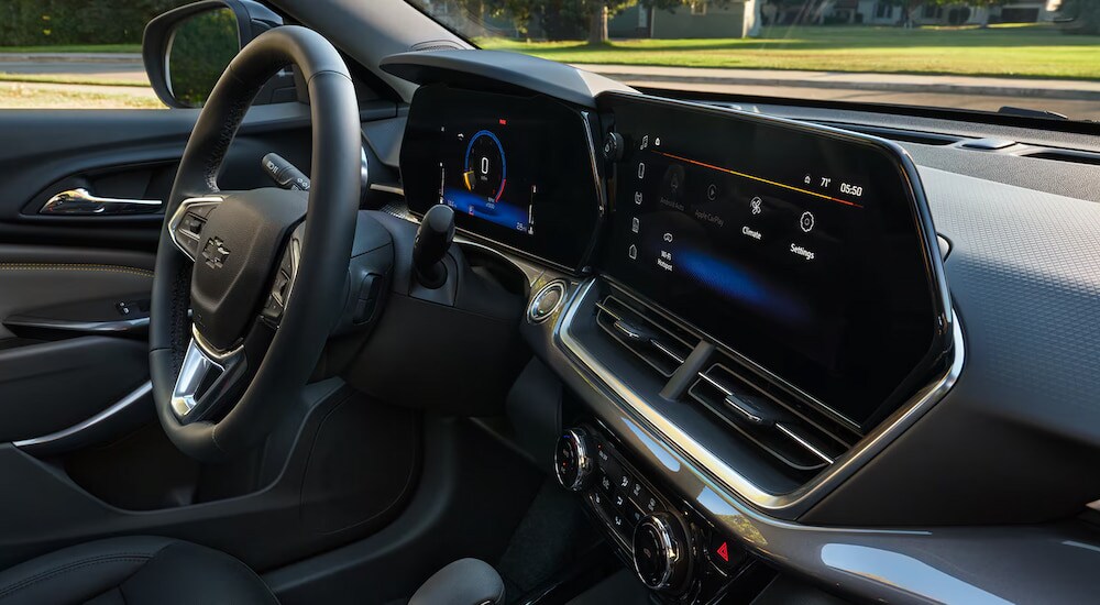 Side view of the dual digital displays in a 2025 Chevy Trax for sale.
