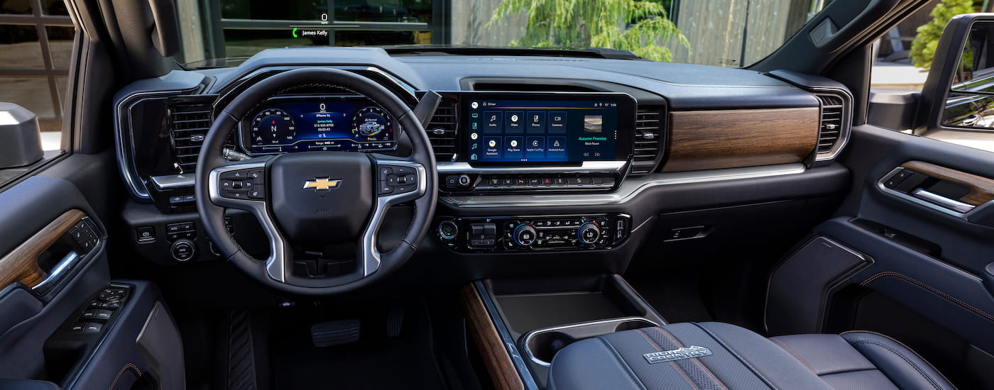 The interior of a 2024 Chevy Silverado 2500 High Country is shown from the driver's seat.