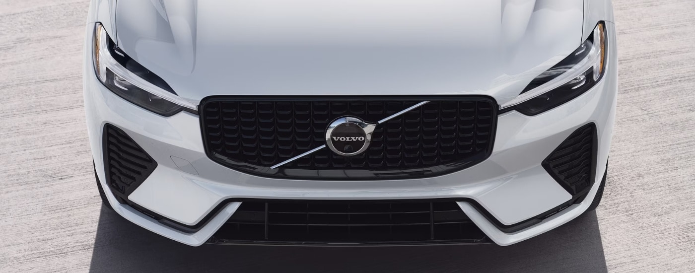 Overhead close-up of the front of a white 2025 Volvo XC60 for sale near Lenox.