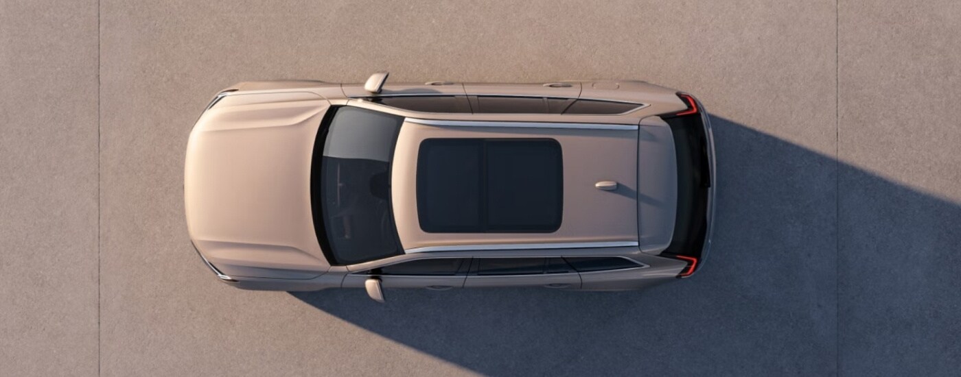 A tan 2025 Volvo XC90 is shown from the top.