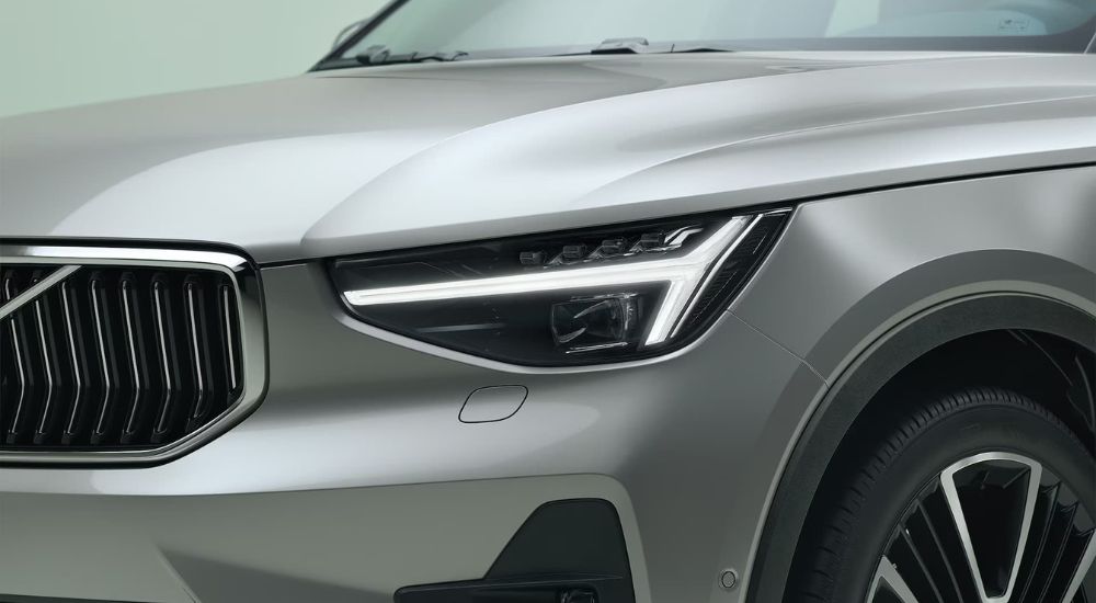 A close up shows driver side headlight on a 2024 Volvo XC40.