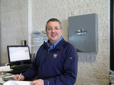 Staff member Tim Crennan from fa8e82267561