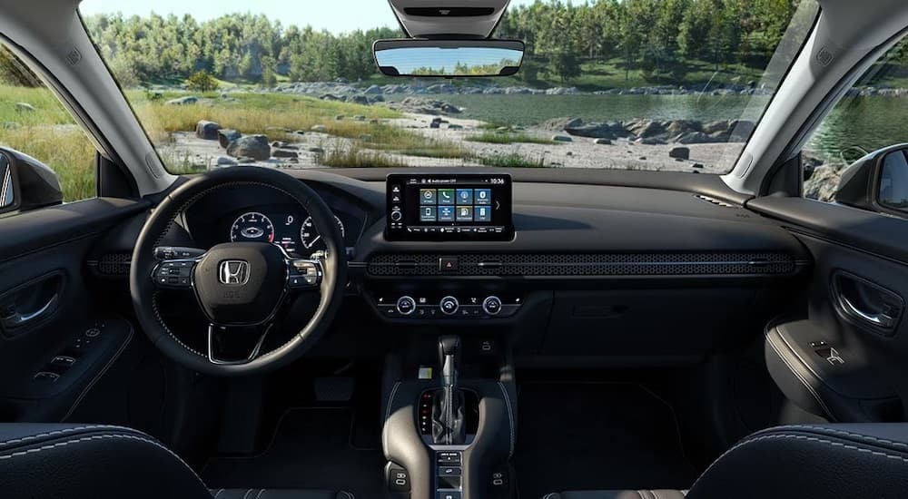 The black interior of a 2024 Honda HR-V is shown from above the center console.