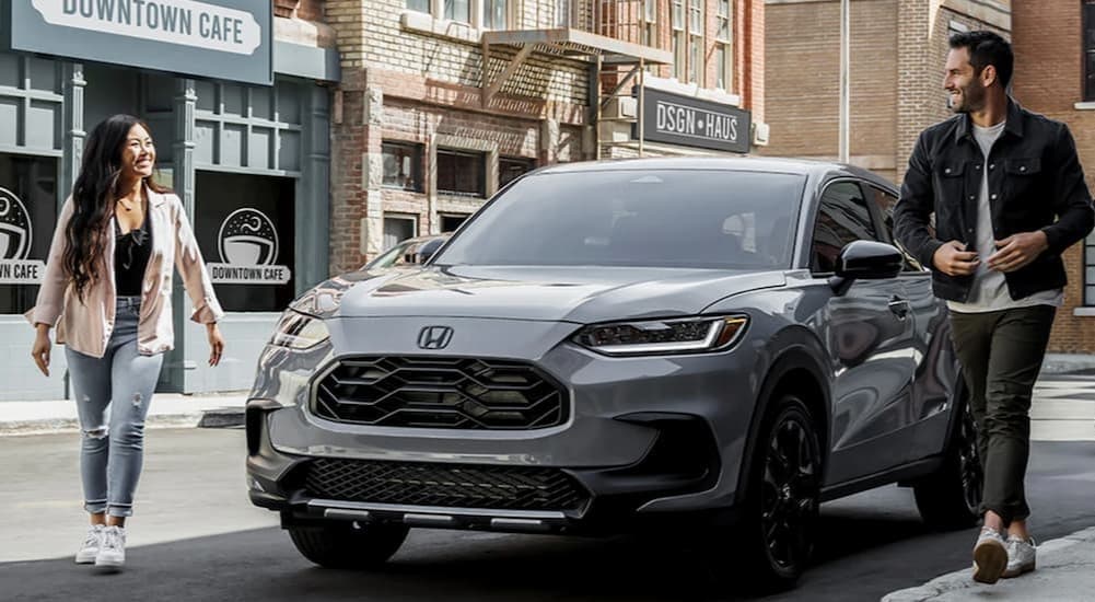 Honda dealership near Pittsfield - 2024 Honda HR-V - Cafe.jpg A silver 2024 Honda HR-V is shown parked near a cafe after visiting a Honda dealership near Pittsfield.