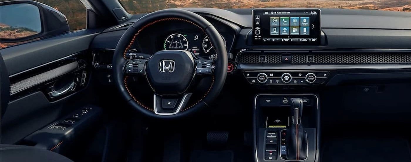 The black interior and dash are shown in a 2024 Honda CR-V for sale near Pittsfield.