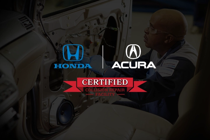 Honda service technician repairing a vehicle's passenger side door panel