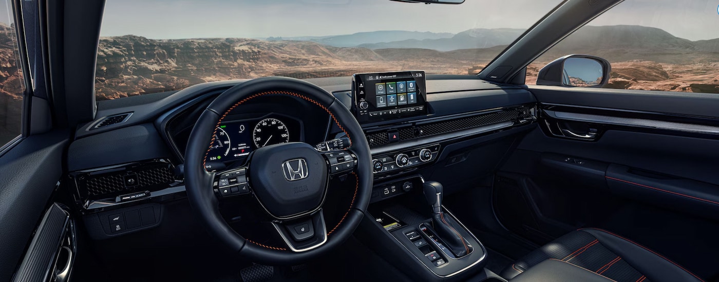 The interior of a 2024 Honda CR-V Hybrid for sale.