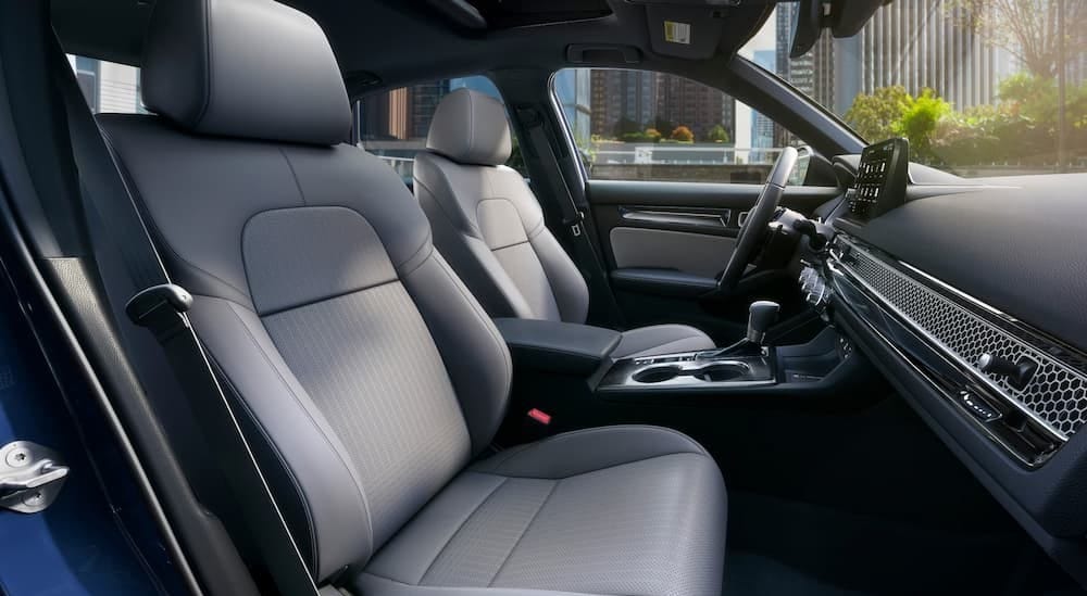 Honda%20Civic%20for%20sale%20-%202025%20Honda%20Civic%20-%20Interiors.jpg The gray interior and dash are shown in a 2025 Honda Civic.