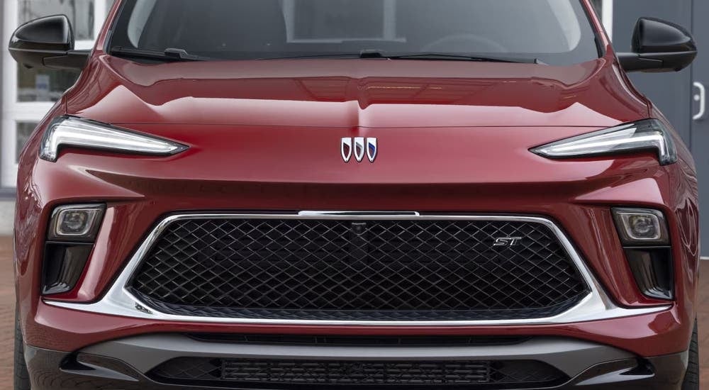 The front of a red parked 2024 Buick Encore GX.