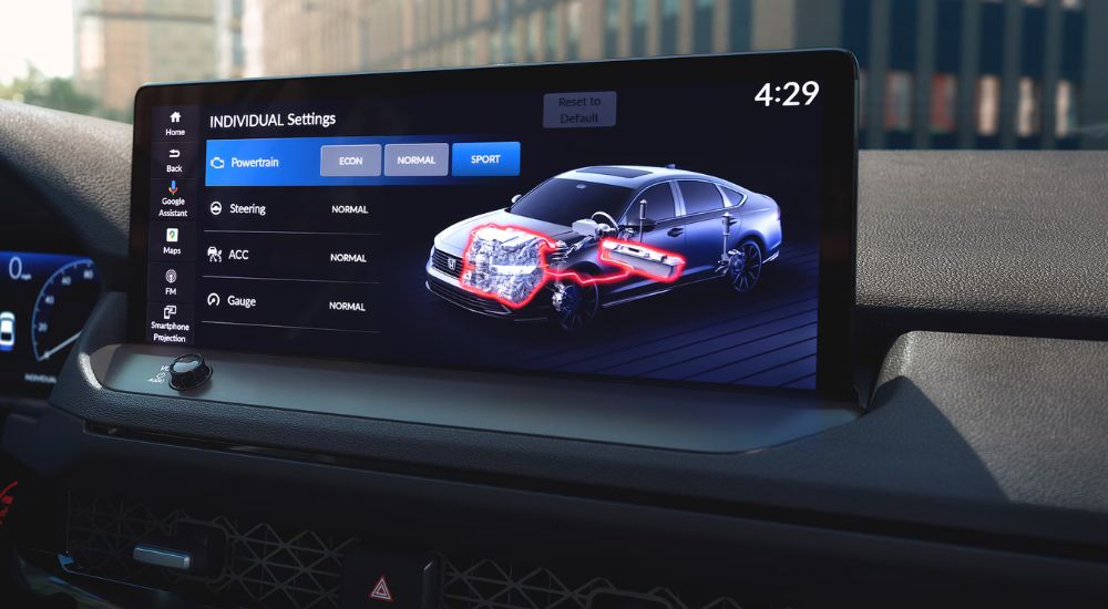 Close-up of the Drive System Settings screen in a 2025 Honda Accord Hybrid for sale.