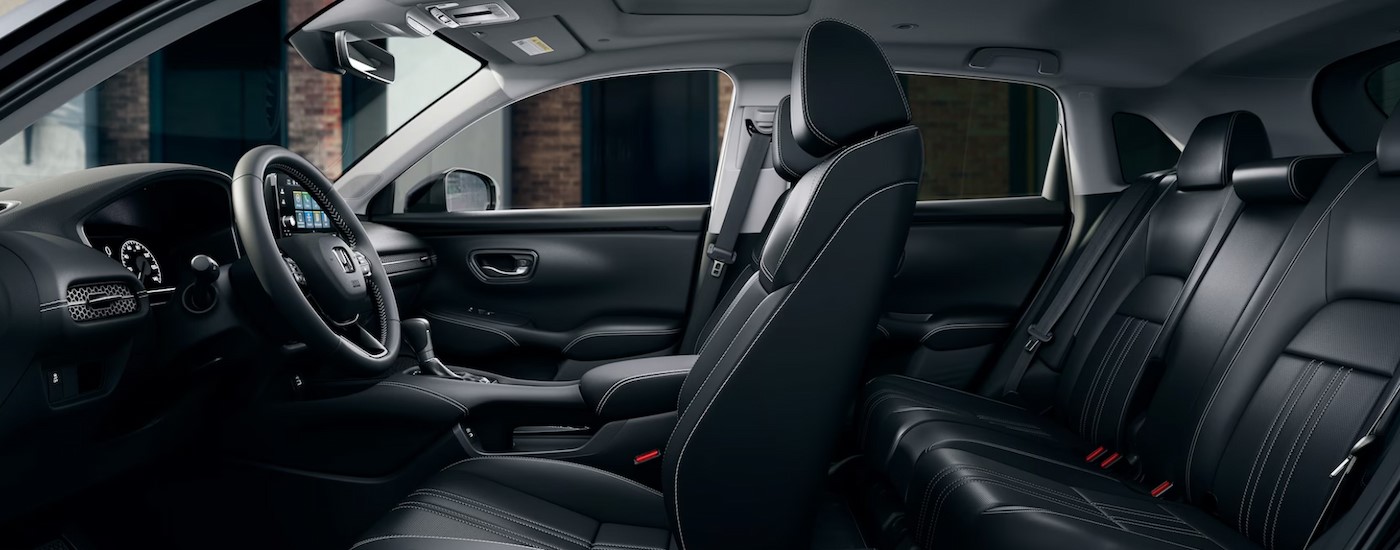 The black interior and dash in a 2024 Honda HR-V is shown.