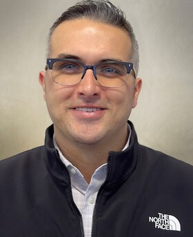 Staff member Jordan Zollman from 1873f4668b19