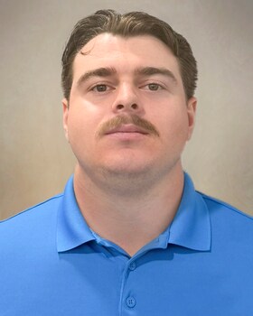 Staff member Corey King from 9a30c548d06a