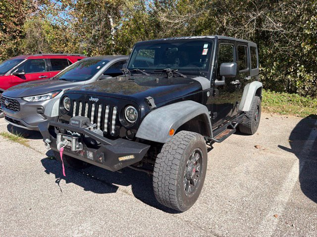 Used 2011 Jeep Wrangler Unlimited Sport with VIN 1J4HA3H1XBL549733 for sale in Bedford, IN