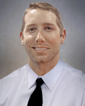 Staff member Logan Lee from a914754c84eb