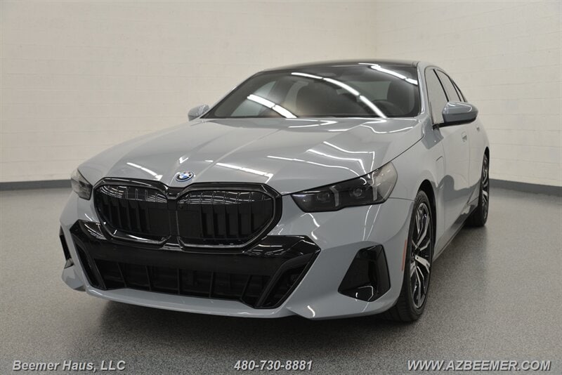 2025 BMW 5 Series 550e xDrive Sedan's photo