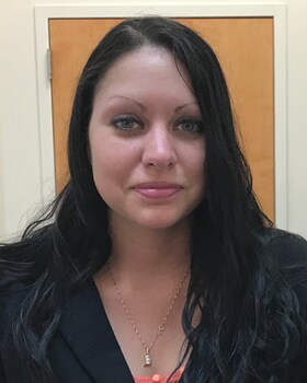 Staff member Carrie Riley from ID_1f50bba7b5ea