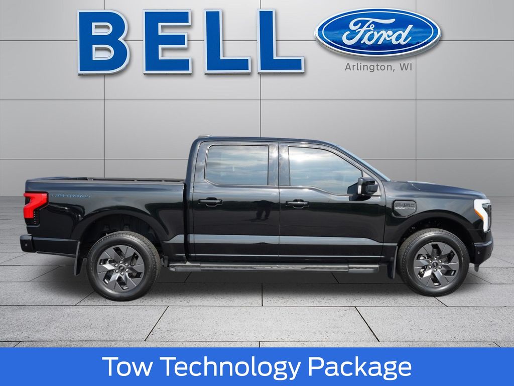 Used 2023 Ford F-150 Lightning Lariat with VIN 1FT6W1EV6PWG08969 for sale in Arlington, WI
