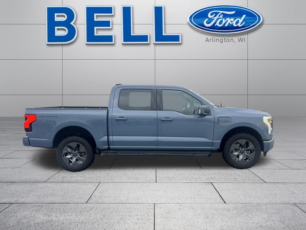 Used 2023 Ford F-150 Lightning Lariat with VIN 1FT6W1EV0PWG11205 for sale in Arlington, WI