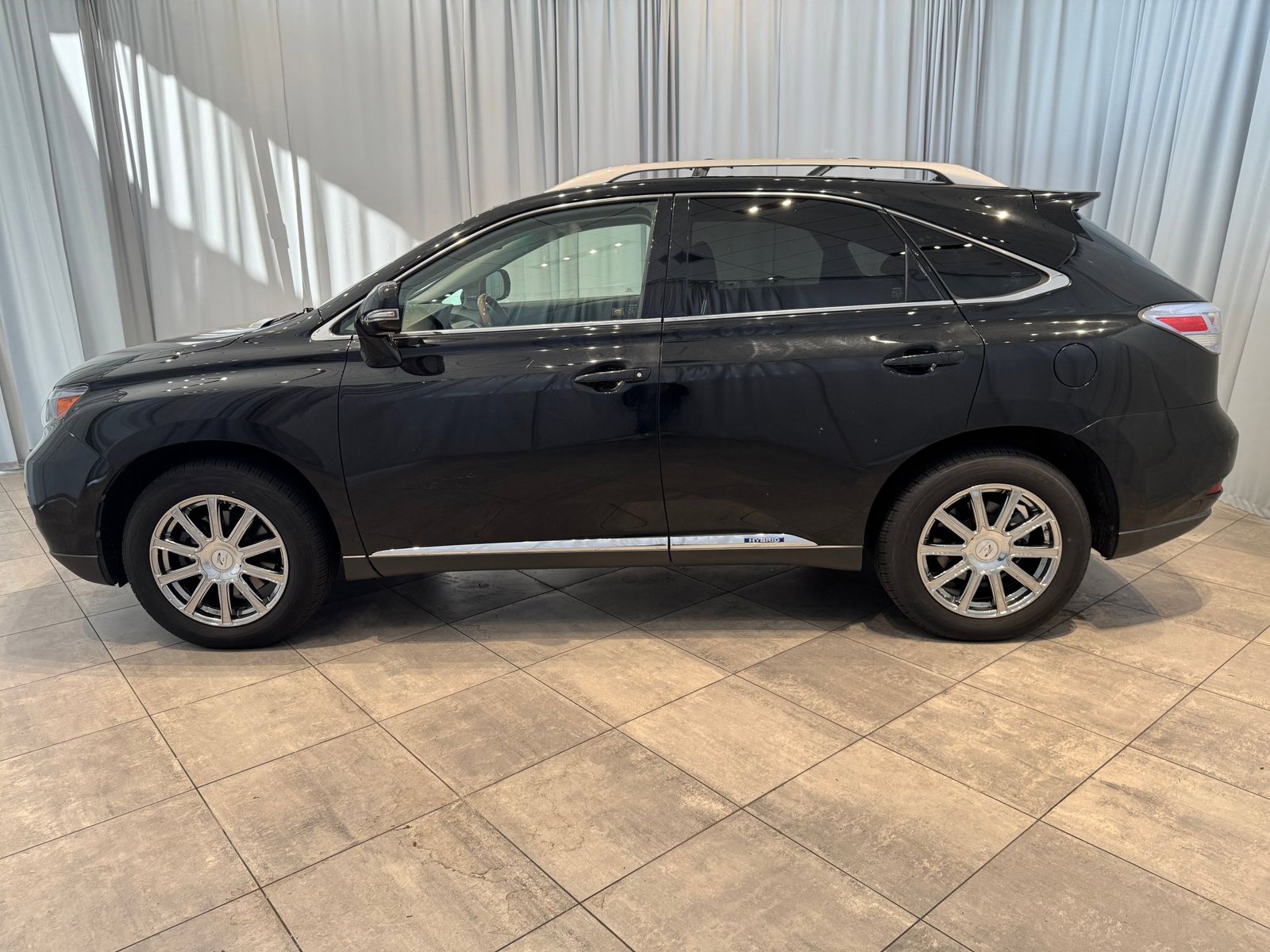 Used 2010 Lexus RX 450h with VIN JTJBC1BA1A2027805 for sale in Bellevue, WA