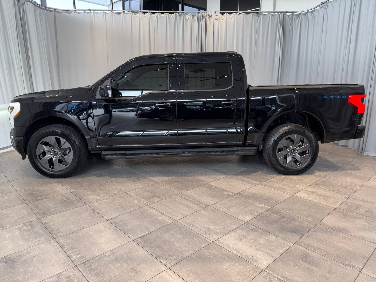 Used 2024 Ford F-150 Lightning Flash with VIN 1FT6W3L79RWG01128 for sale in Bellevue, WA