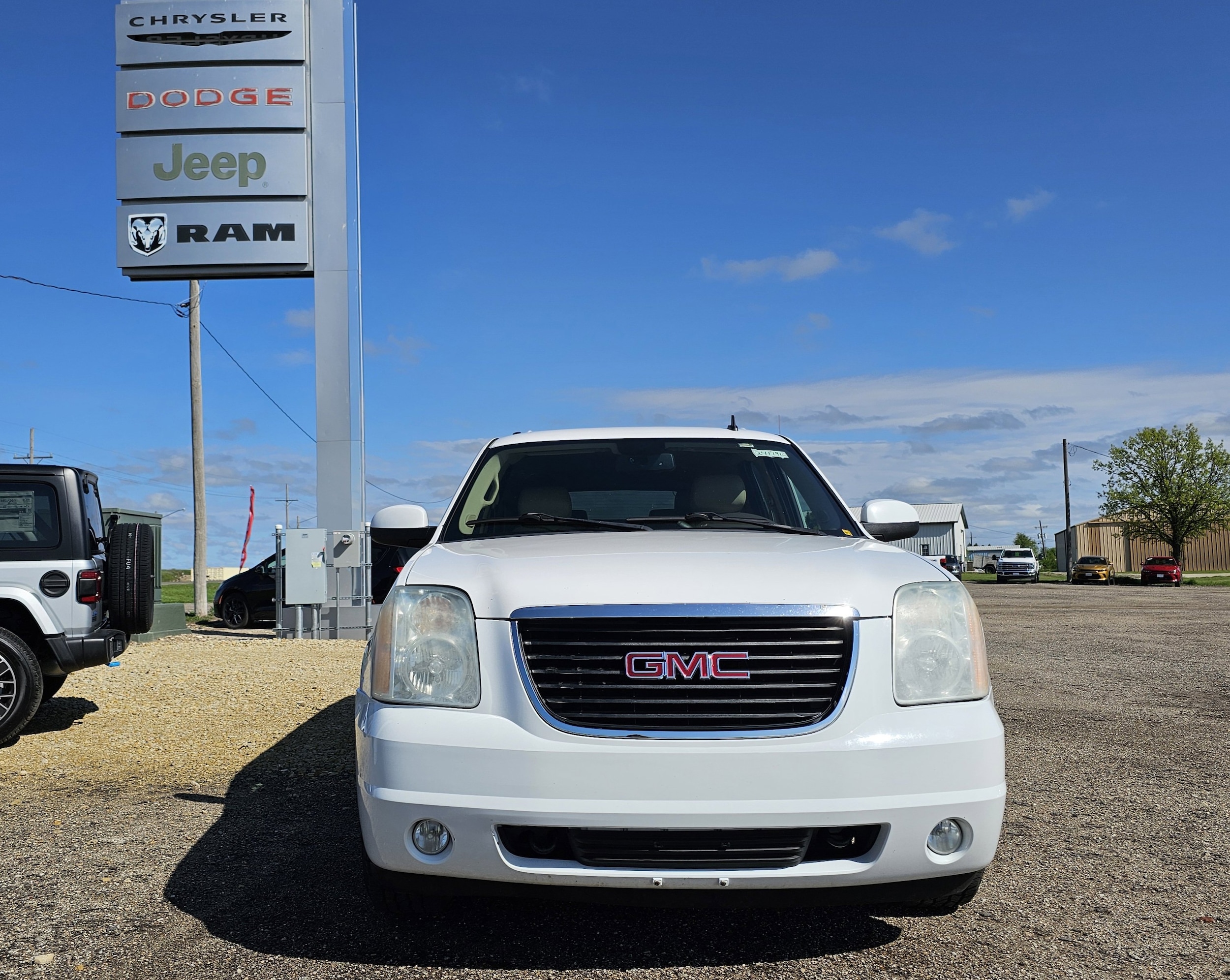 Used 2010 GMC Yukon XL SLT1 with VIN 1GKUKKE33AR245659 for sale in Beloit, KS