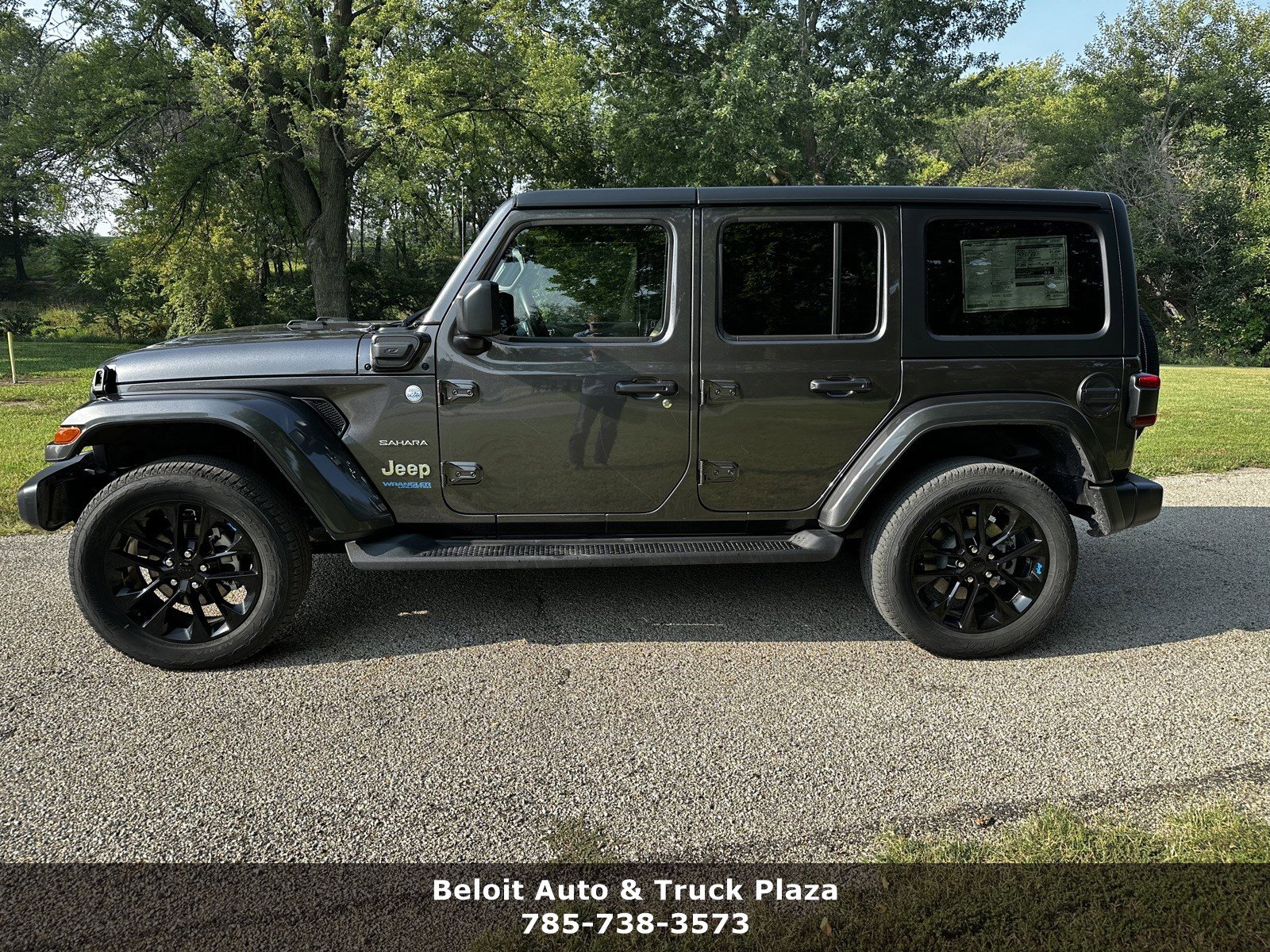 Certified 2022 Jeep Wrangler Unlimited Sahara 4XE with VIN 1C4JJXP61NW280603 for sale in Beloit, KS